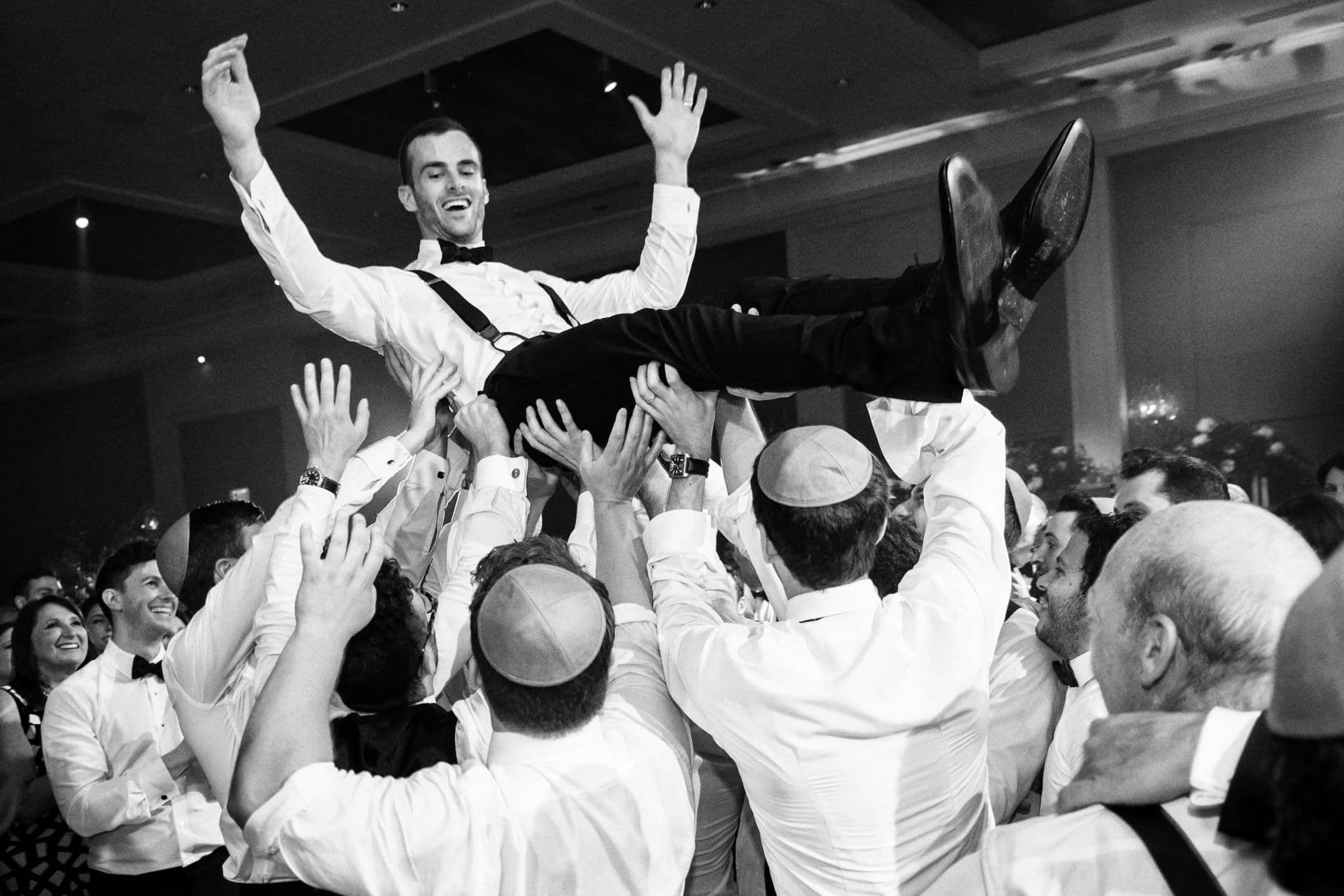 jarred garfinkle westmount happy jewish wedding shaar hashomayim hora man lifting